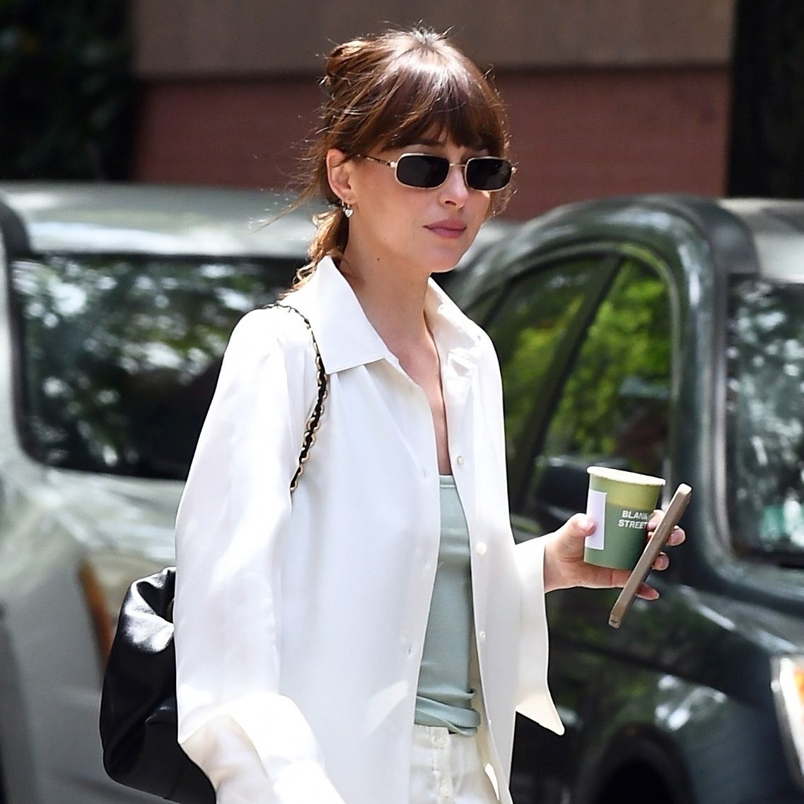 Dakota Johnson Wore the Un-Trendy Shoe Trend Everyone Is Wearing With Skirts